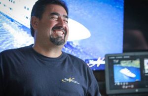 Divemaster Pedro is all smiles as he welcomes guests onboard