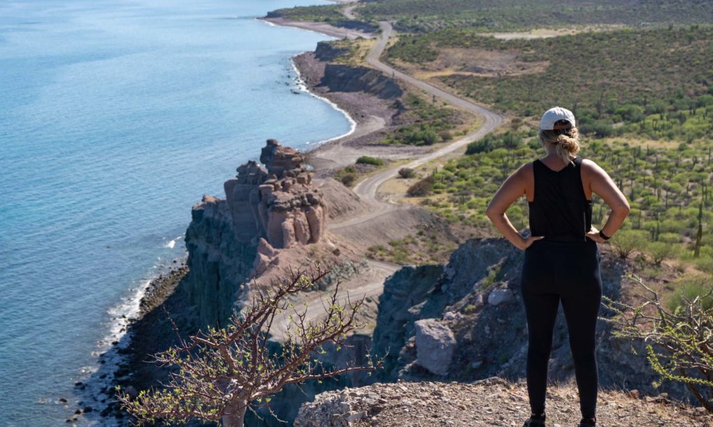 Guest looking at the peninsula's rugged terrain and remote roads. Considerations to make driving safe in Baja Mexico.